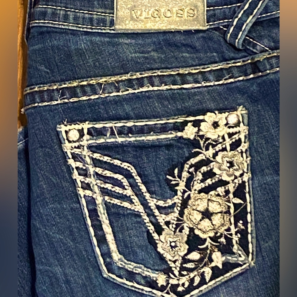 Sold V Goss Denim Jeans flared leg and in size long.  Worn once just cleaning